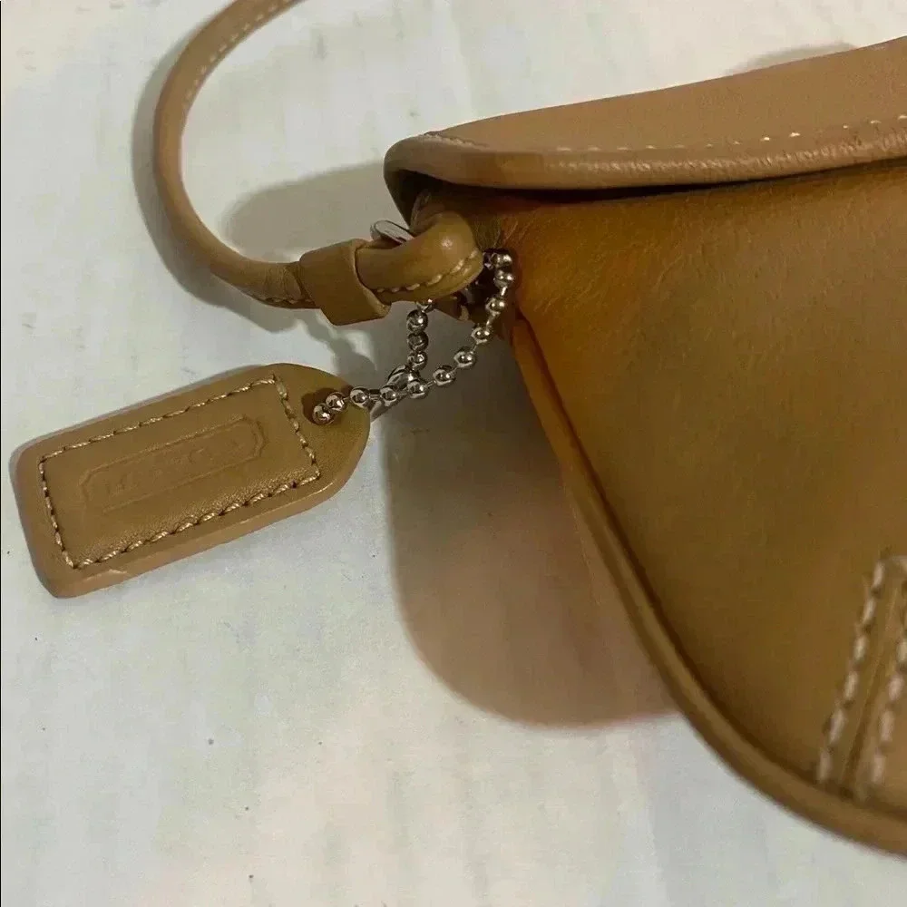 Coach vintage beige/ brown leather wristlet bag